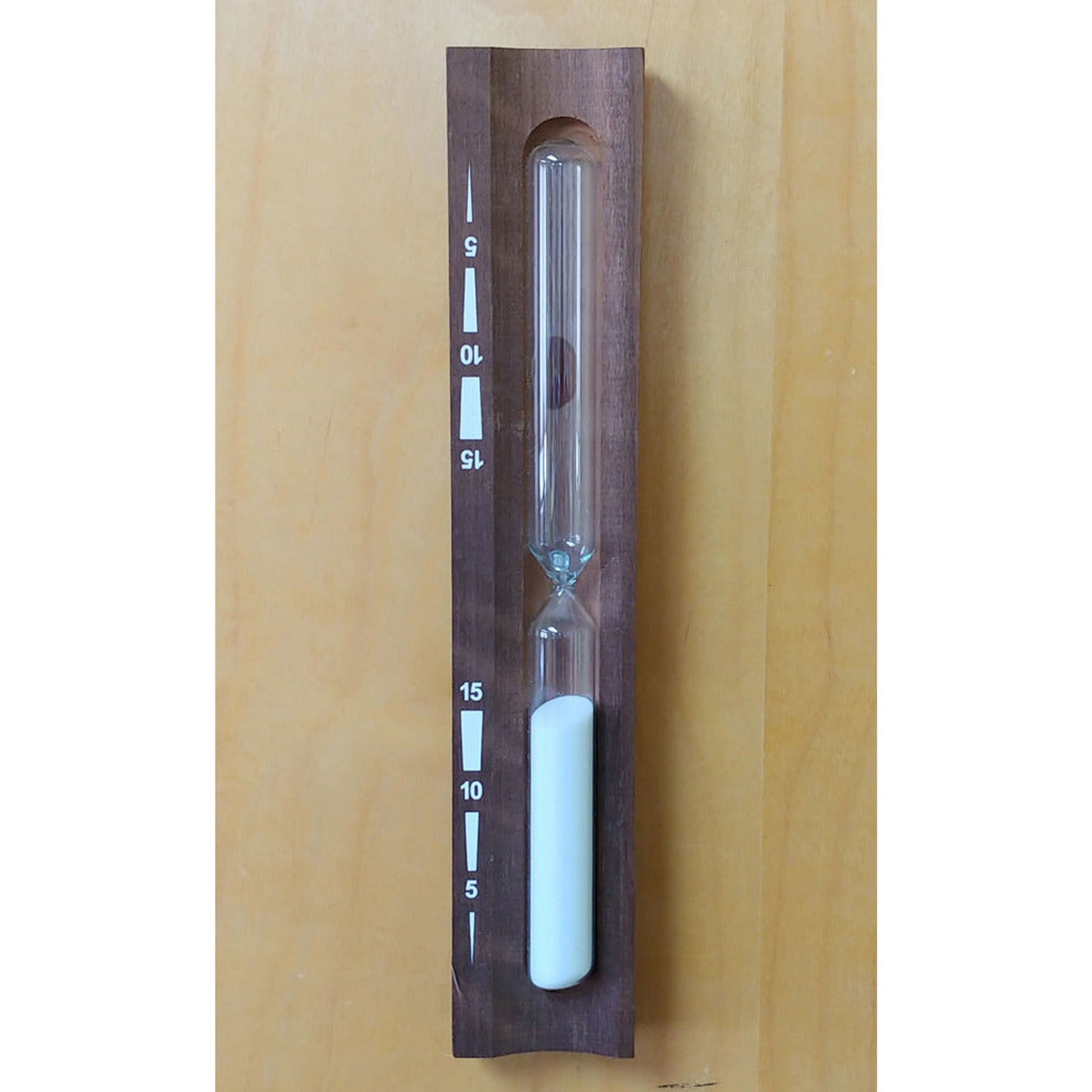 Harvia Lux Sauna Sandglass Timer, hourglass sand timer mounted in a wooden holder with 5 to 15 minute markings