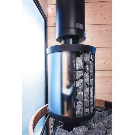 Harvia WP250LD Sauna Water Heater for Legend Stoves, 25 Liter, installed in a wood paneled sauna corner showing the steel water tank and chimney pipe