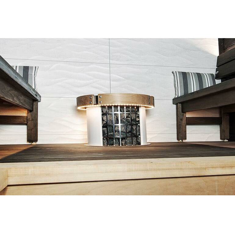 Harvia Cilindro LED Safety Railing for 6 & 8kW Sauna Heaters, installed on a heater between two cushioned sauna benches, LED ring glowing.