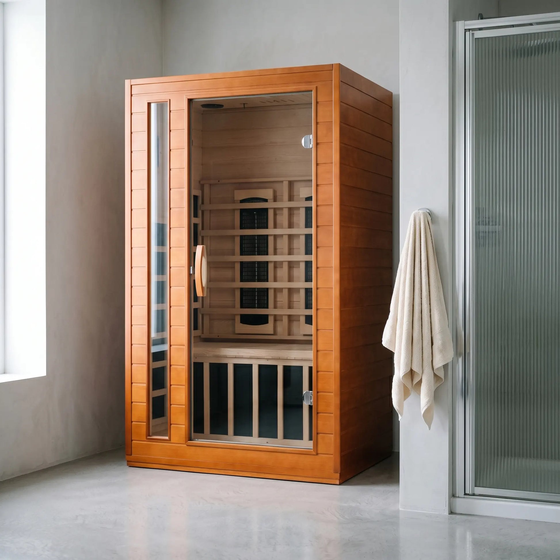 Golden Designs Dynamic Cordoba full spectrum near zero EMF infrared sauna styled in a modern home interior