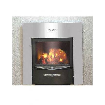 Harvia 36 Duo Wood-Burning Sauna Stove, close up of the glass firebox door with visible flames, mounted on a tiled wall.