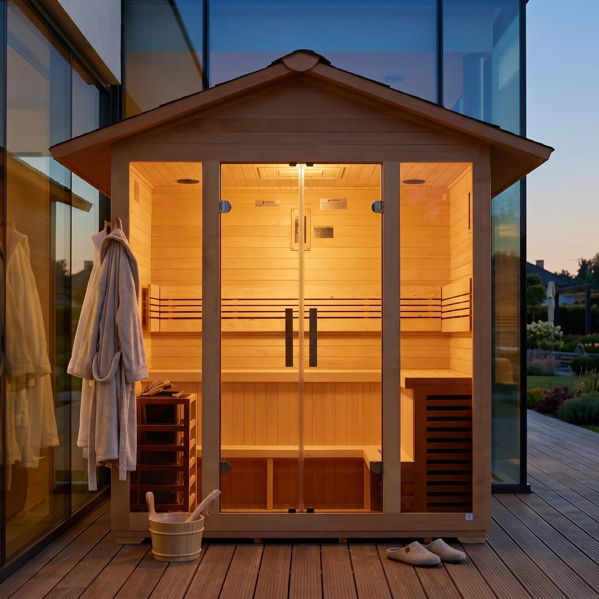 Golden Designs Vorarlberg 5-Person Outdoor Traditional Sauna styled on an outdoor patio at home