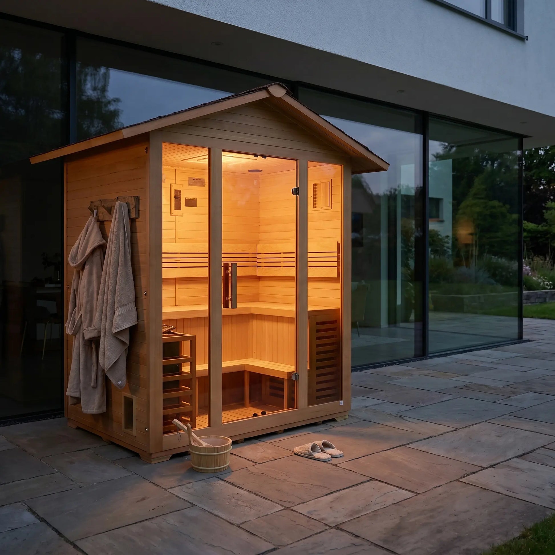 Golden Designs Vorarlberg 5-Person Outdoor Traditional Sauna shown installed in a backyard setting