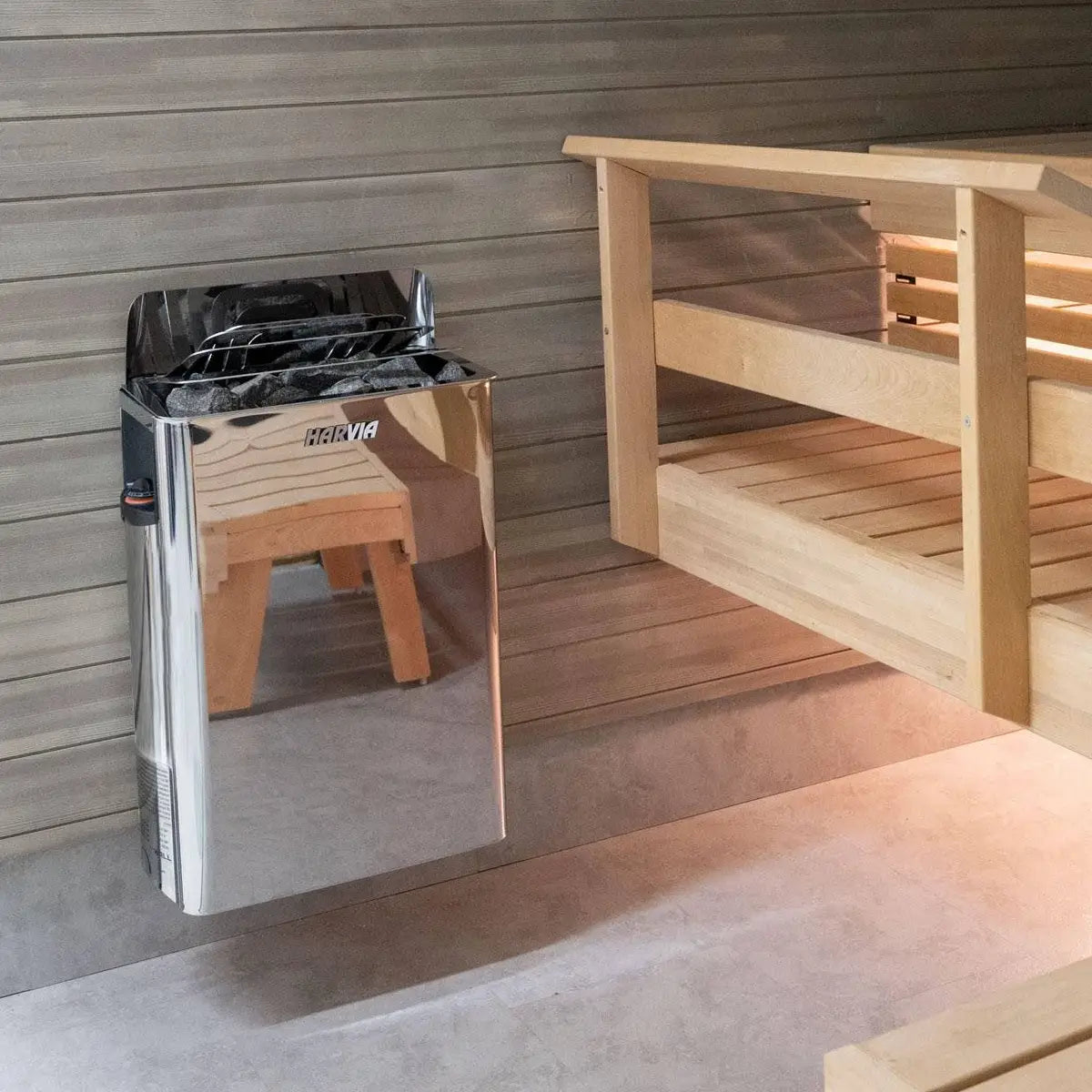 Harvia The Wall SWS80 8kW Electric Sauna Heater with Built-In Controls, stainless steel unit mounted on a wood paneled sauna wall