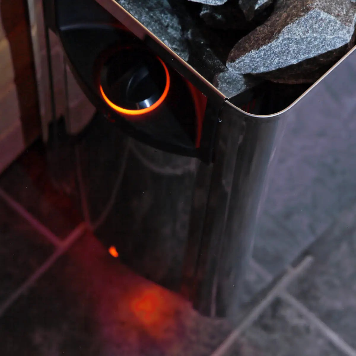Harvia The Wall SWS80 8kW Electric Sauna Heater with Built-In Controls, close-up of the illuminated control dial and power button
