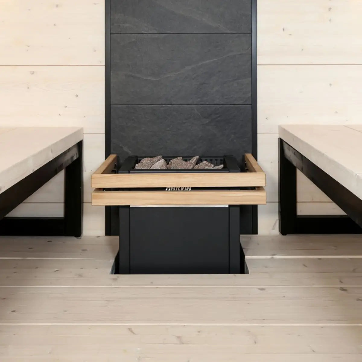 Harvia Virta HL60 6kW Ultimate Electric Sauna Heater Kit, close up of wood guard corner joint next to heater stones