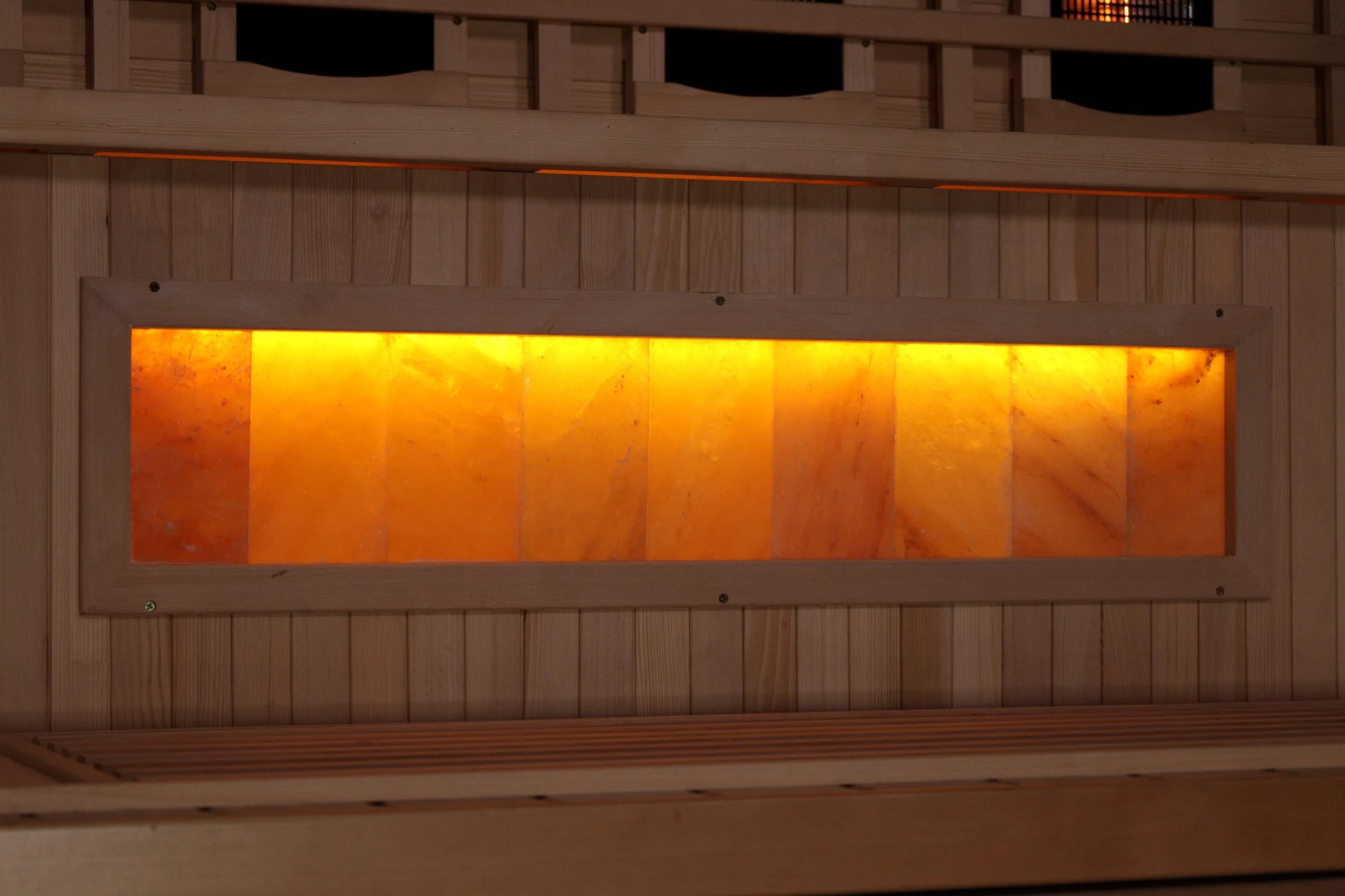 Himalayan salt bar mounted below the bench in the Reserve full spectrum sauna