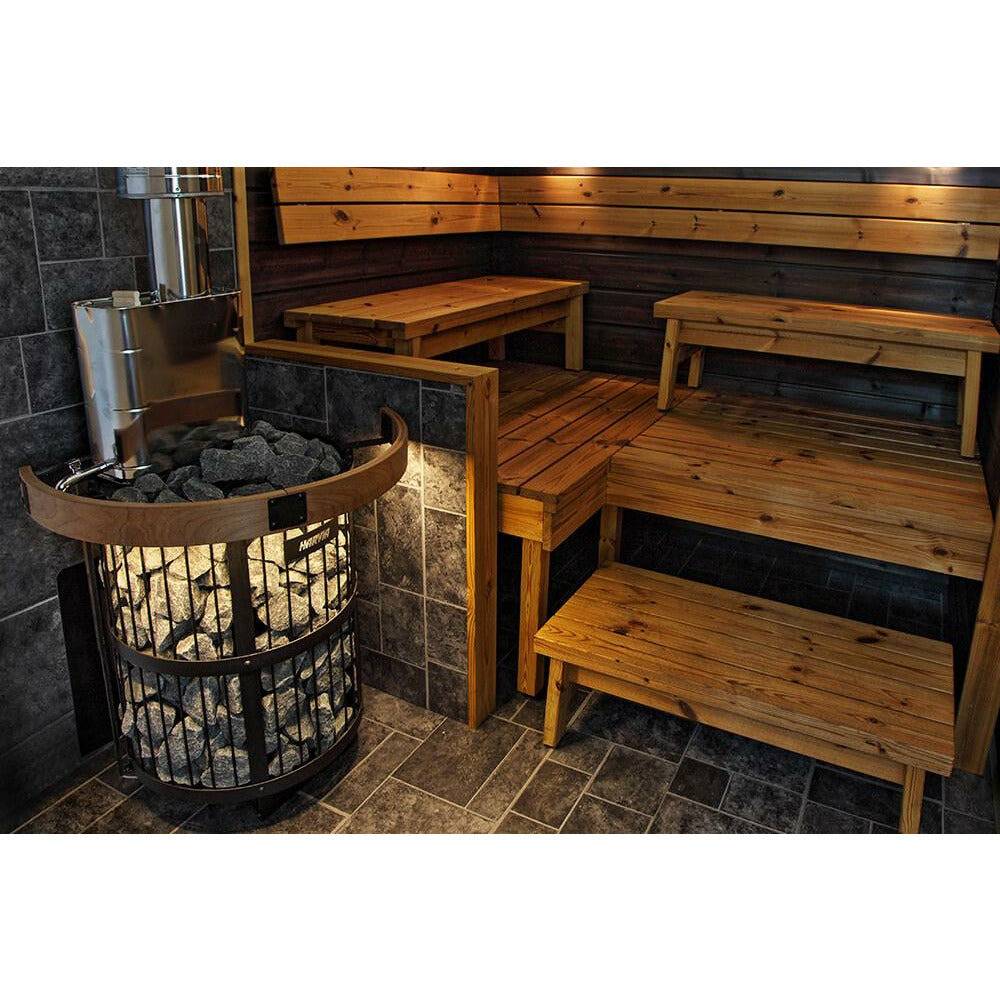Harvia Legend 150 SL 16kW Wood-Burning Sauna Stove, installed in a wood paneled sauna corner with benches and a chimney pipe