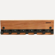 Harvia Legend Clothes Hanger SASPO103, close up front view on a white background showing wood grain and black hooks