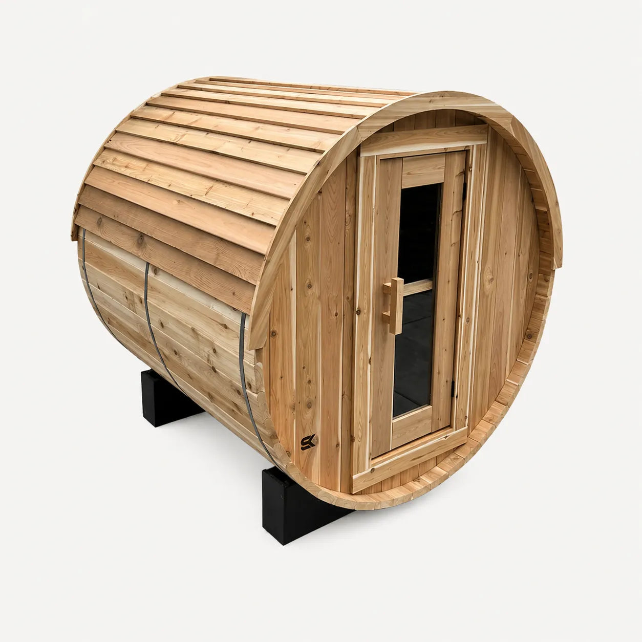 The Sweat Barrel cedar barrel sauna with shingled roof, front-angled view showing glass door and Sweat Kingdom branding.