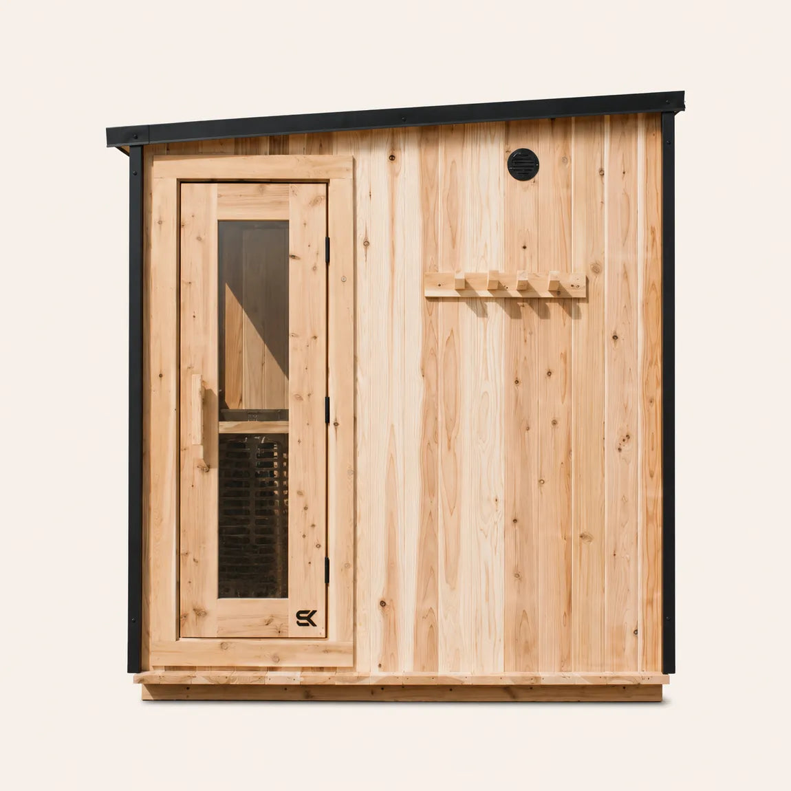 The Summit cedar 4-6 person outdoor sauna front-angled view on white background showing slanted roof, glass door with SK logo, side window, and exterior cedar peg rack.