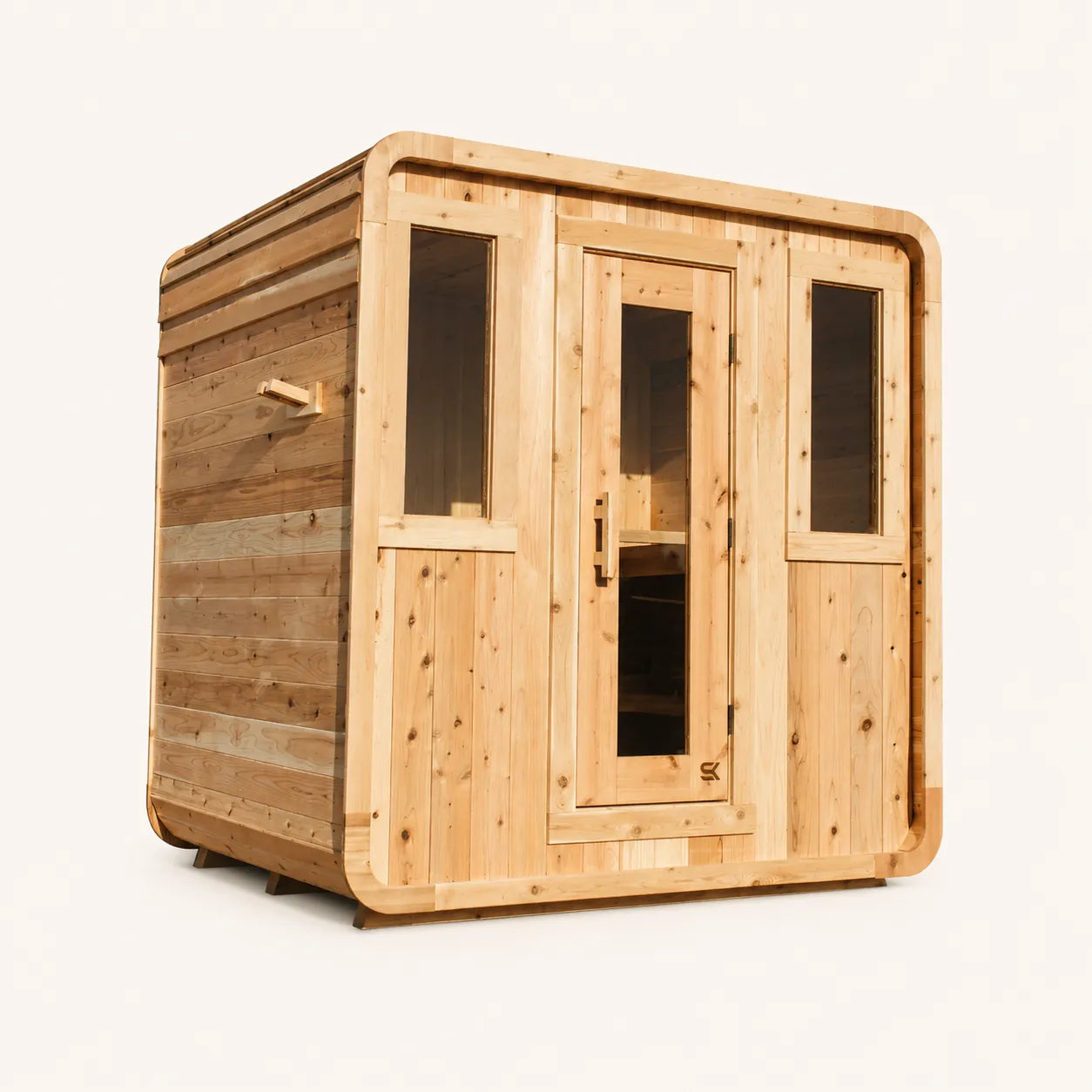 The Sweat Cabin Deluxe cedar 6-person sauna three-quarter angle on white background showing rounded corners, glass door, two side windows, and exterior cedar siding.
