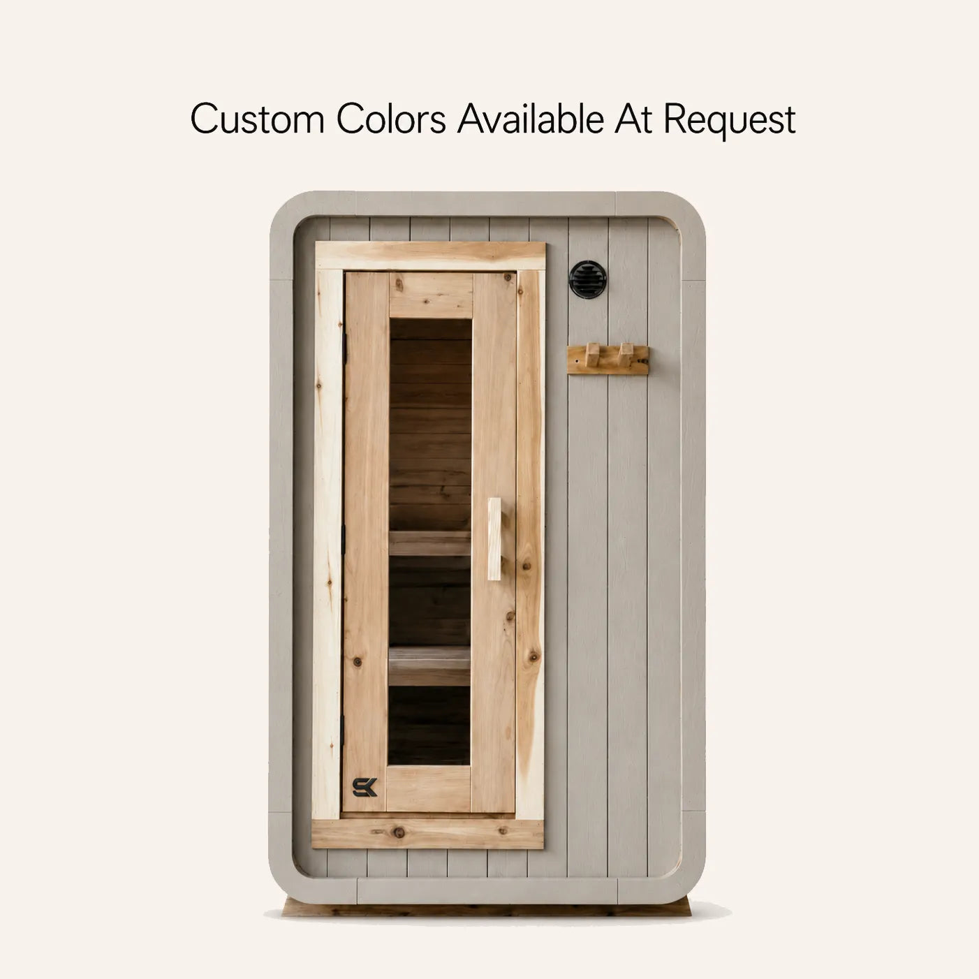 The Sweat Pod sauna shown in a custom gray finish with caption noting custom colors are available on request.