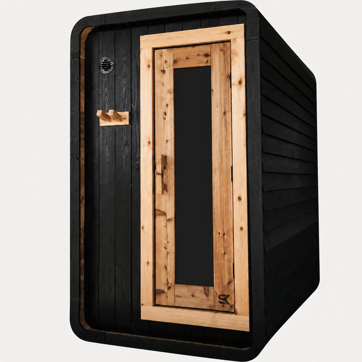 The Sweat Pod Black Edition charred cedar sauna with natural cedar door frame, front-angled view on white background.