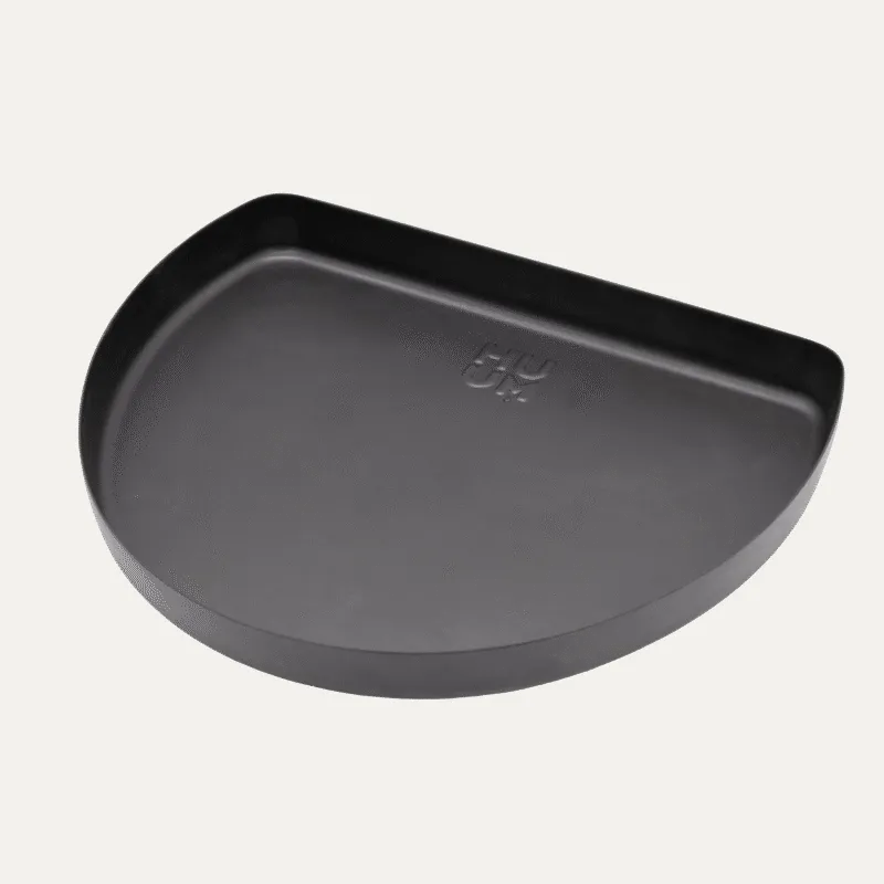 Black HUUM DROP drip tray accessory for collecting water beneath the sauna heater