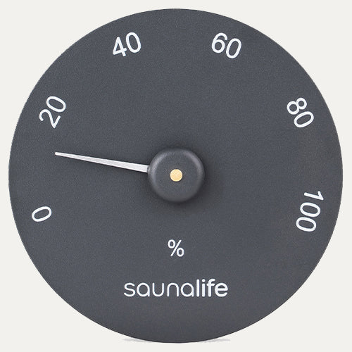 Close-up of SaunaLife black round sauna hygrometer with 0 to 100 percent humidity scale