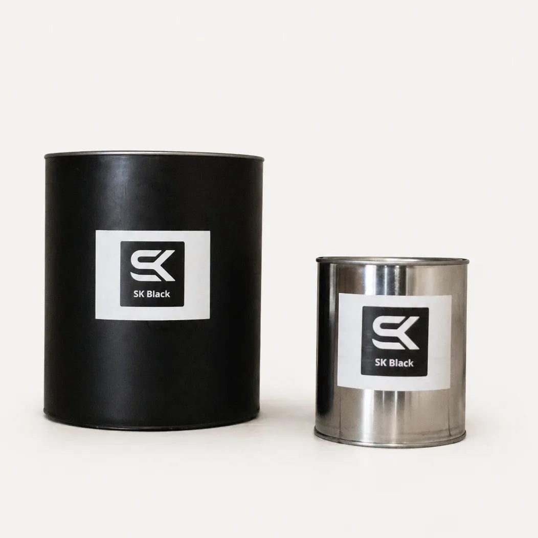 SK Sauna Stain in SK Black shown in gallon and quart cans for exterior sauna wood protection