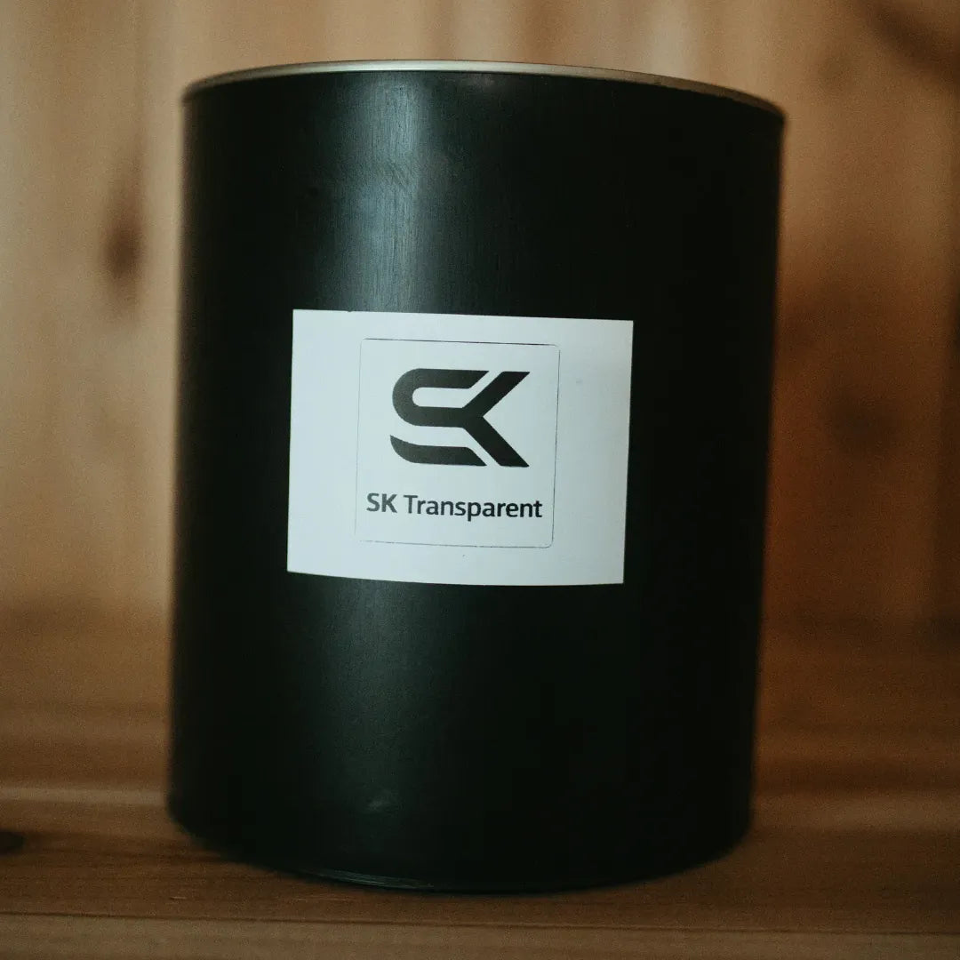 Close-up of SK Clear transparent sauna stain gallon can for exterior sauna wood protection